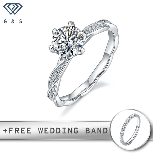 A charming sterling silver engagement ring with a 1.00ct moissanite center stone, featuring intricate vintage-inspired detailing.