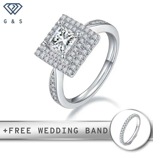 A stunning engagement ring featuring a 1.00ct princess cut moissanite surrounded by a double halo of sparkling stones.