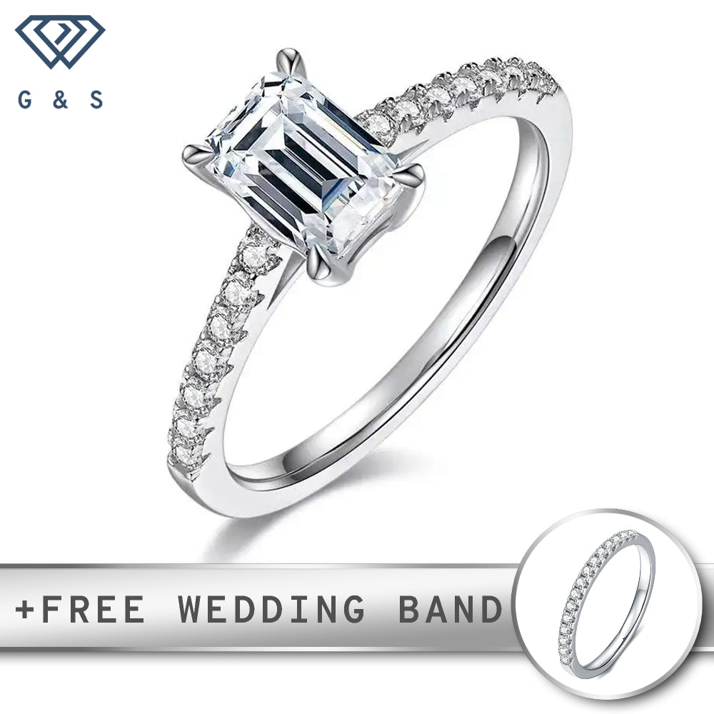 A classic engagement ring featuring a 1.00ct emerald cut moissanite held securely in an elegant basket setting.