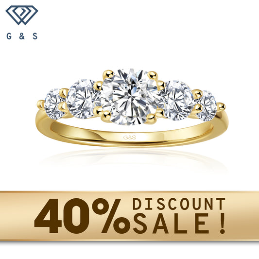 A 9ct yellow gold engagement ring featuring five beautifully cut cushion moissanites, symbolizing enduring love.