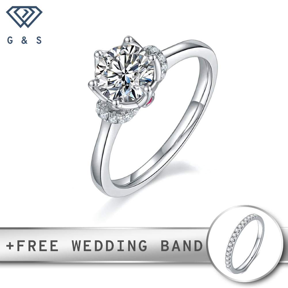 A beautifully detailed sterling silver engagement ring featuring a 1.00ct moissanite center stone surrounded by an intricate floral design.