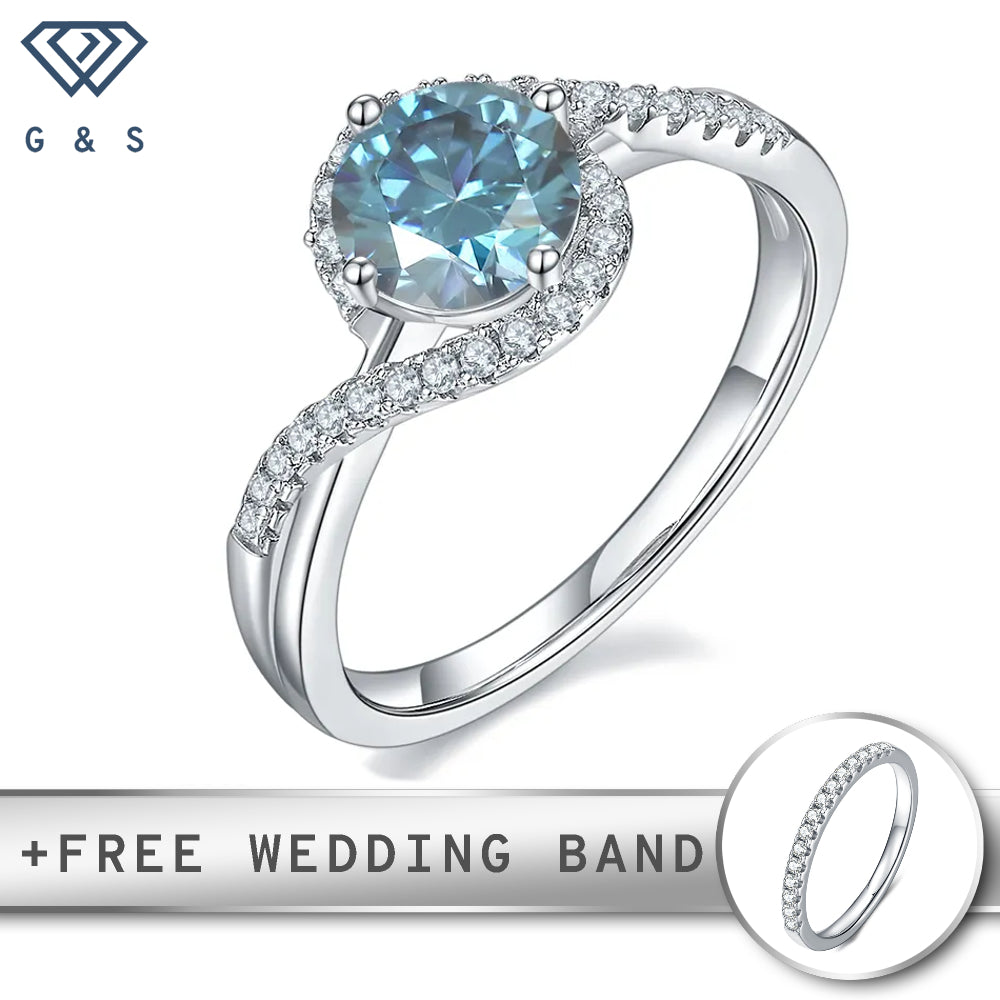 A sterling silver engagement ring featuring a vibrant 1.00ct blue moissanite center stone surrounded by a sparkling halo.