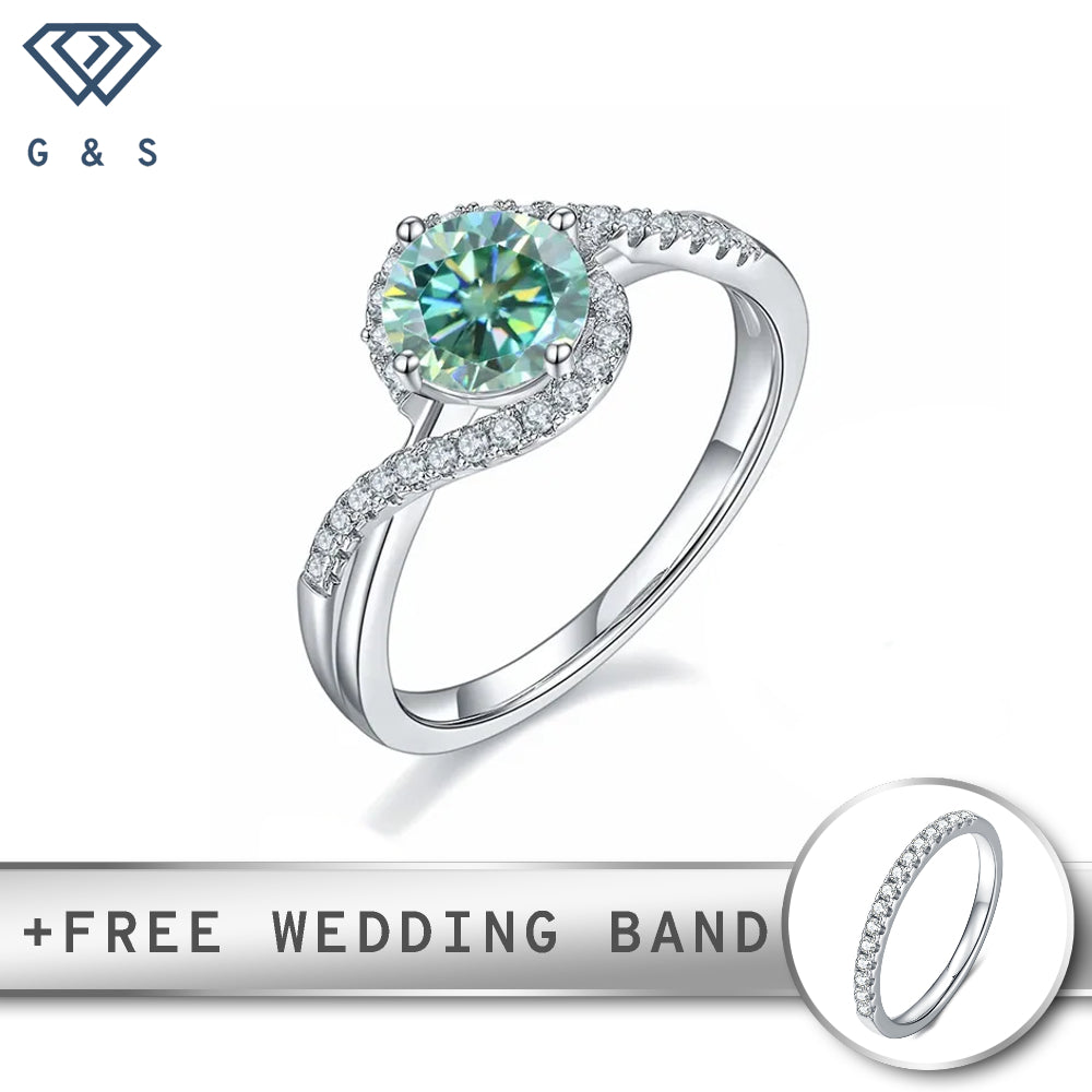 A 1.00ct green moissanite sparkles within a halo of smaller stones, set in a polished sterling silver band.