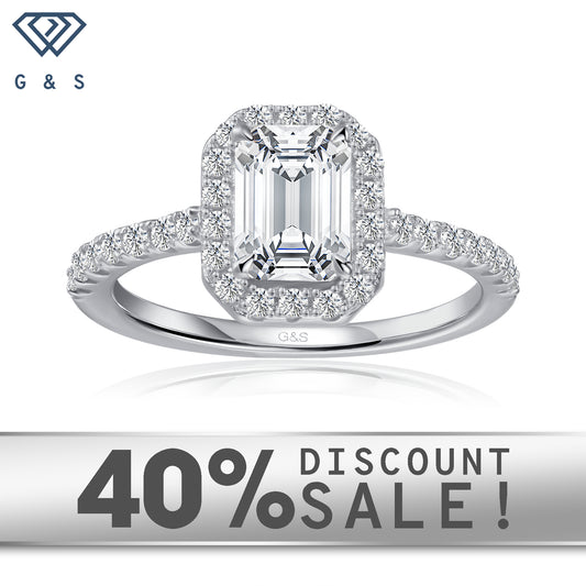 Forever Classic Halo emerald cut moissanite engagement ring in 9ct white gold.