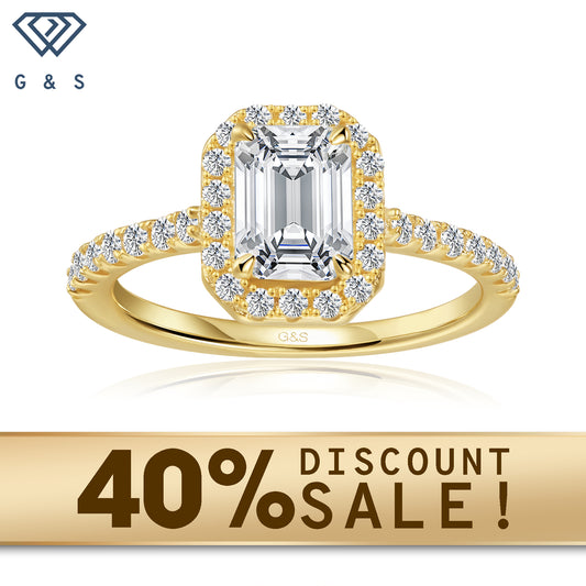 A 9ct yellow gold engagement ring featuring an emerald cut moissanite surrounded by a sparkling halo.
