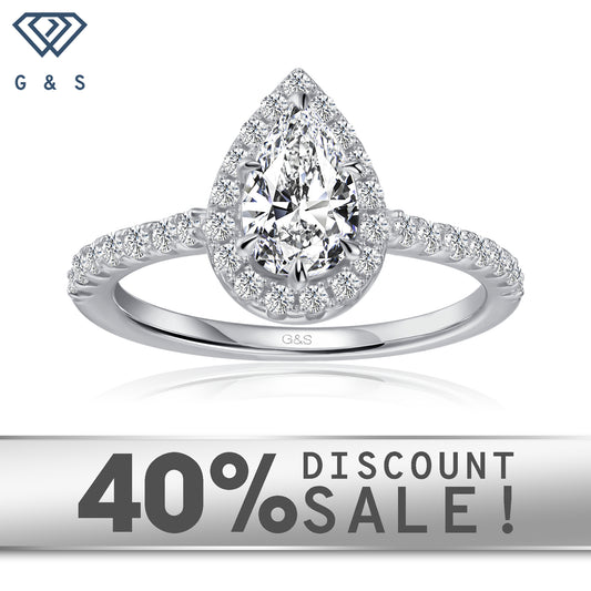 Forever Classic Halo pear-shaped moissanite engagement ring set in 9ct white gold.