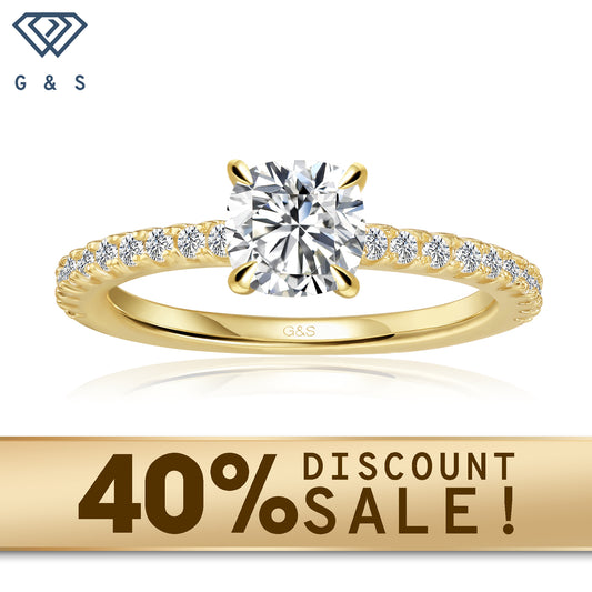 A 9ct yellow gold engagement ring featuring a cushion cut moissanite with a hidden halo for added sparkle.