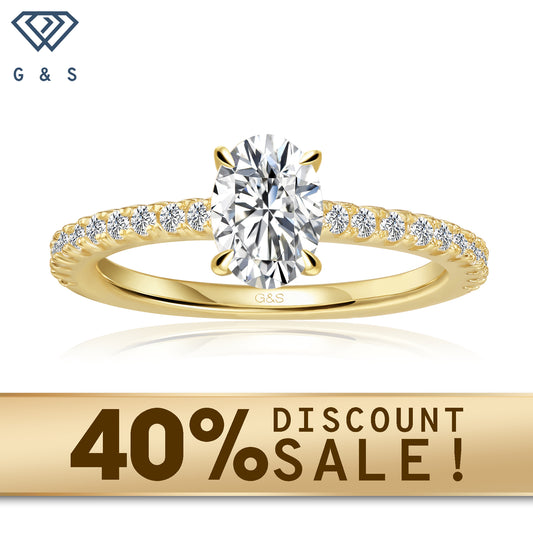 A 9ct yellow gold engagement ring featuring an oval cut moissanite with a hidden halo for extra sparkle.