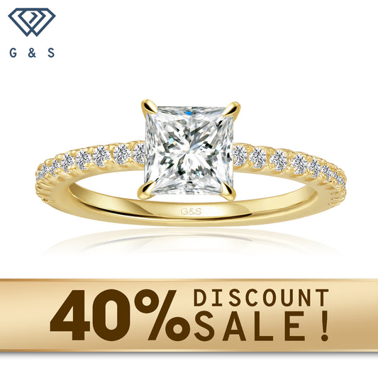 A 9ct yellow gold engagement ring with a discreet hidden halo and a brilliant princess cut moissanite.