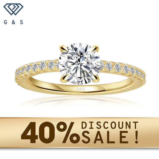A 9ct yellow gold engagement ring featuring a round brilliant moissanite with a hidden halo for extra sparkle.