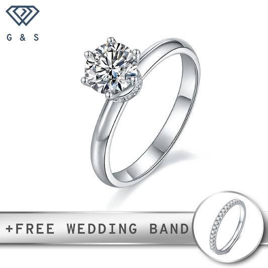 A classic and elegant engagement ring featuring a brilliant 1.00ct moissanite with a delicate hidden halo, set in polished sterling silver.