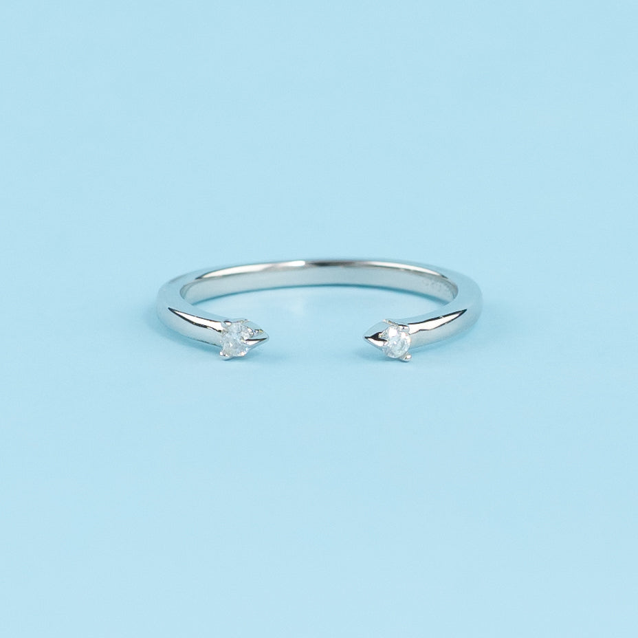 A beautiful and enduring wedding band set featuring sparkling moissanites.