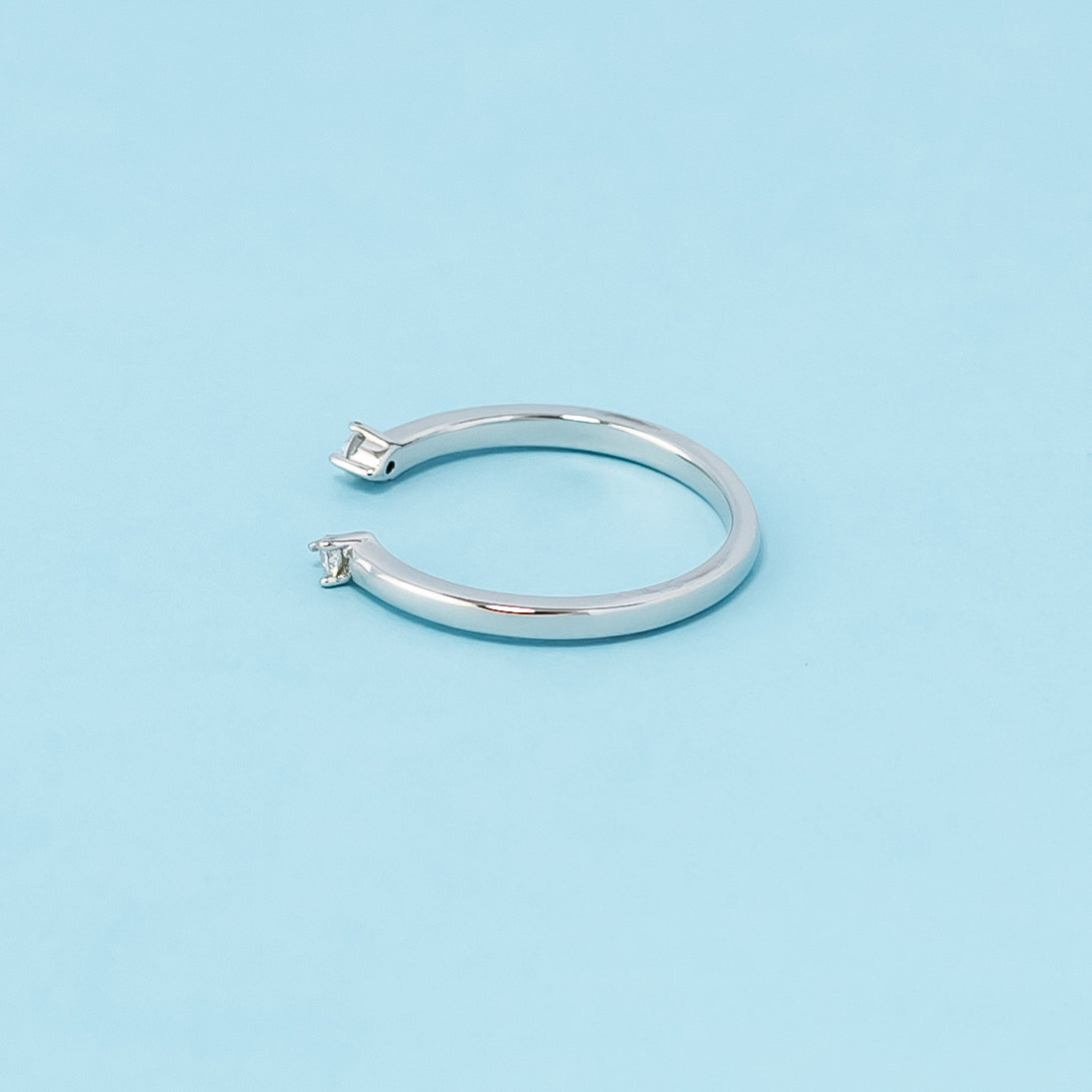 A stunning wedding band set crafted from 9ct white gold and adorned with brilliant moissanites.
