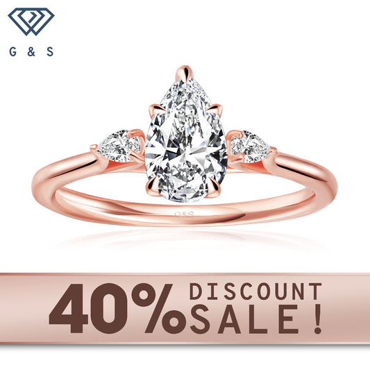 Infinite Love Trilogy pear-shaped moissanite engagement ring set in 9ct rose gold.