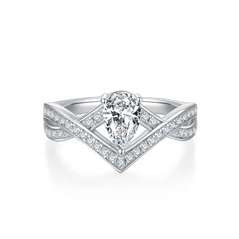 Infinity engagement ring featuring a brilliant pear-cut moissanite gemstone.