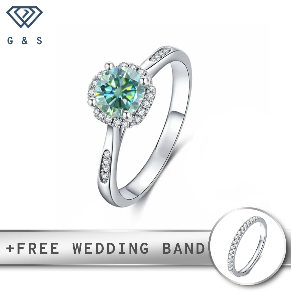 A contemporary sterling silver ring featuring a vibrant 1.00ct green moissanite center stone surrounded by a sparkling halo.