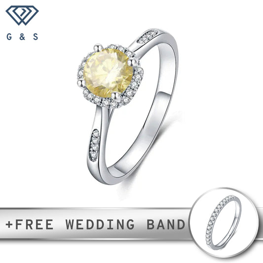A contemporary design featuring a 1.00ct yellow moissanite center stone surrounded by a sparkling halo, all elegantly crafted in lustrous sterling silver.