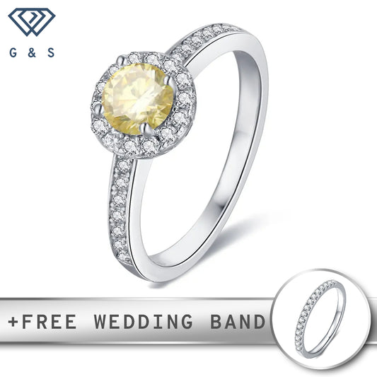 A delicate sterling silver engagement ring featuring a vibrant 0.50ct yellow moissanite center stone surrounded by a sparkling pave halo.