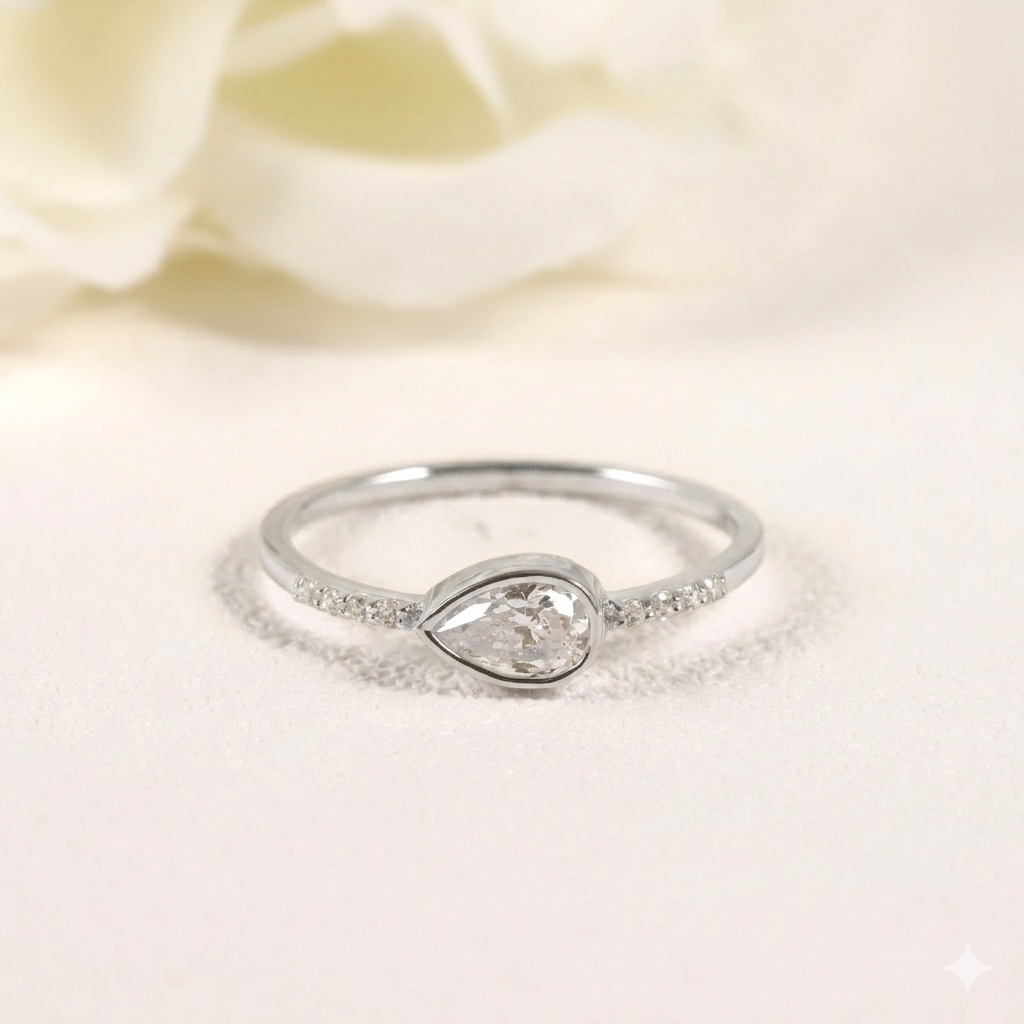 Pear Cut Moissanite Bezel Stacking Ring in Sterling Silver