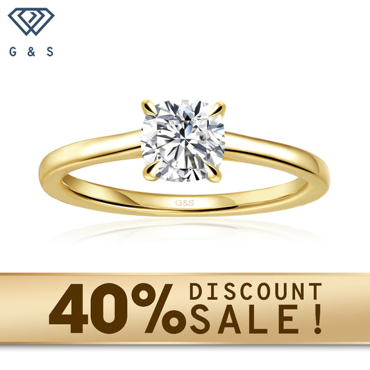A 9ct yellow gold engagement ring featuring a cushion cut moissanite with a hidden halo for extra sparkle.