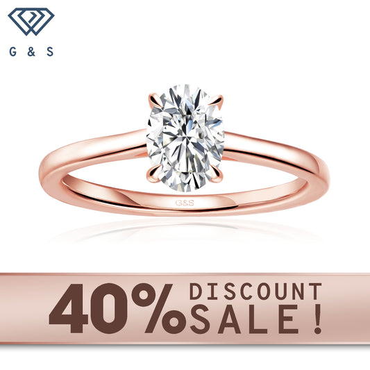 Secret Sparkle hidden halo oval cut moissanite engagement ring in 9ct rose gold.