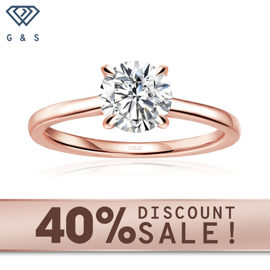 Secret Sparkle hidden halo round brilliant moissanite engagement ring in 9ct rose gold.