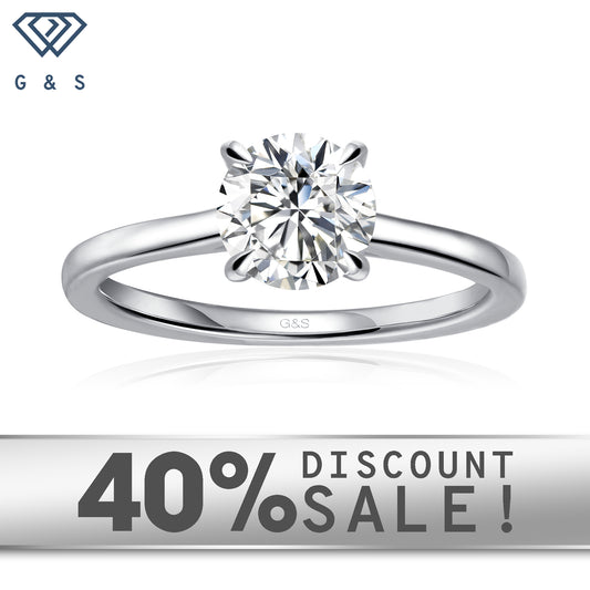 Secret Sparkle Hidden Halo round brilliant moissanite engagement ring set in 9ct white gold.
