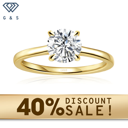 A 9ct yellow gold engagement ring featuring a round brilliant moissanite with a hidden halo for extra sparkle.