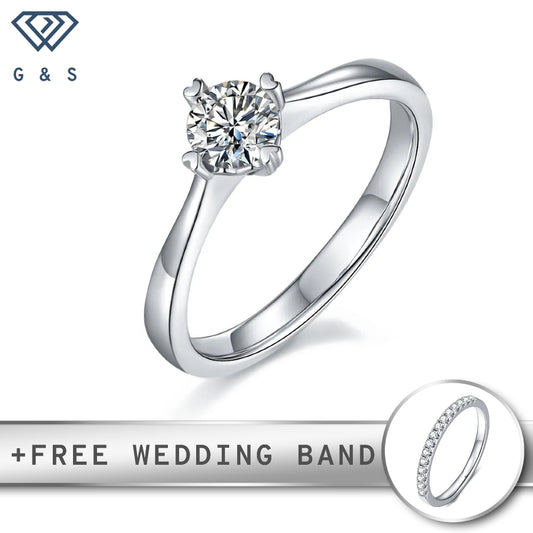A delicate sterling silver engagement ring featuring a 0.50ct moissanite held by four charming heart-shaped claws.