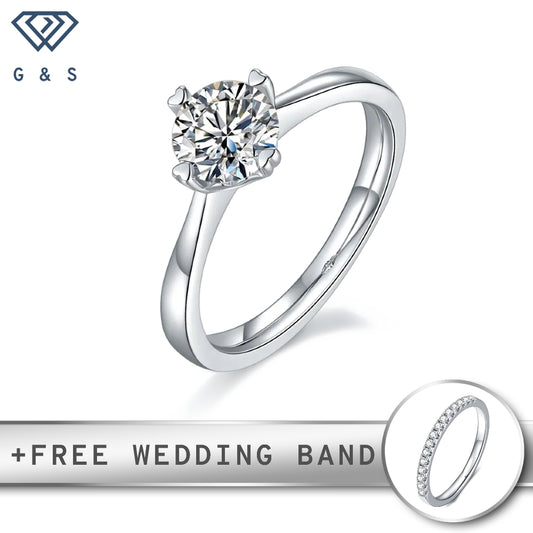 A classic engagement ring featuring a 1.00ct moissanite, held securely by four delicate heart-shaped prongs, set in polished sterling silver.