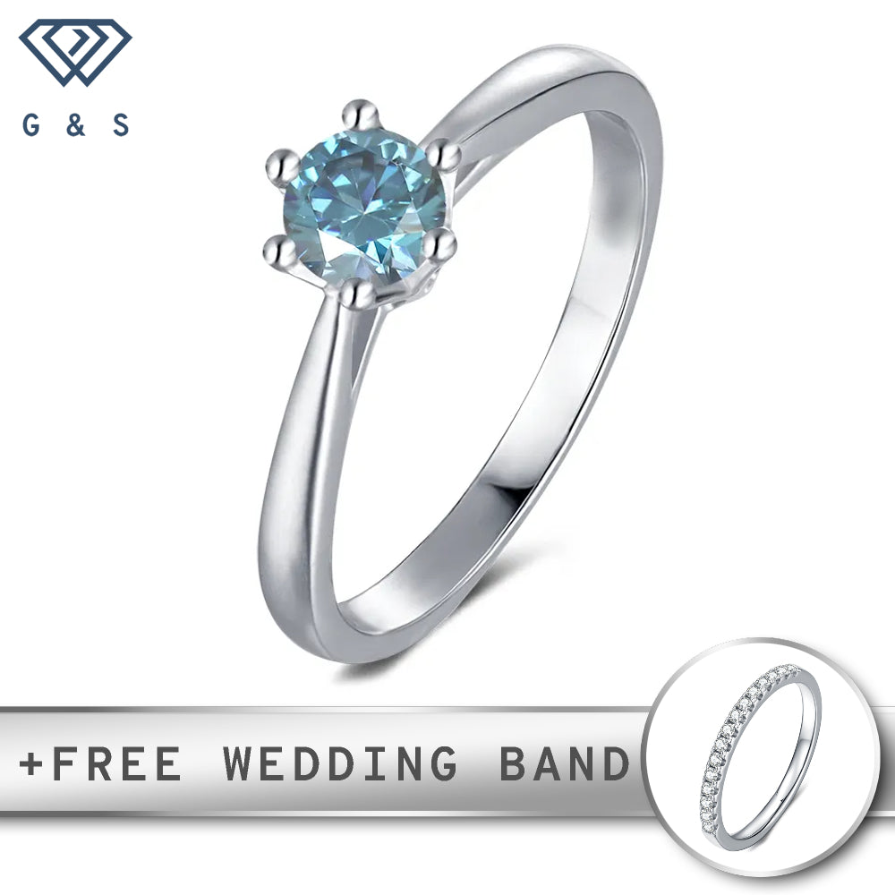 A delicate sterling silver engagement ring featuring a 0.50ct blue moissanite held by six claws in a unique floral basket design.