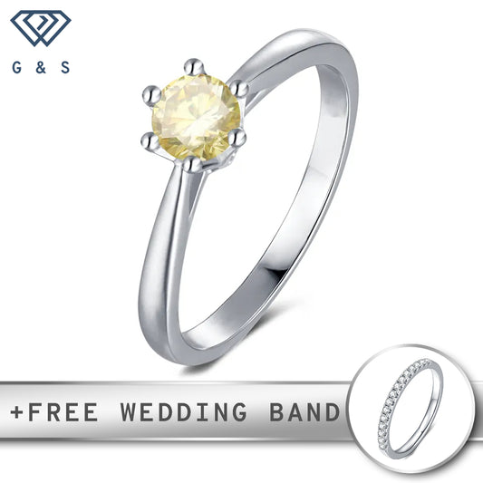 A sterling silver engagement ring featuring a vibrant yellow moissanite held in a delicate 6-claw floral basket setting.