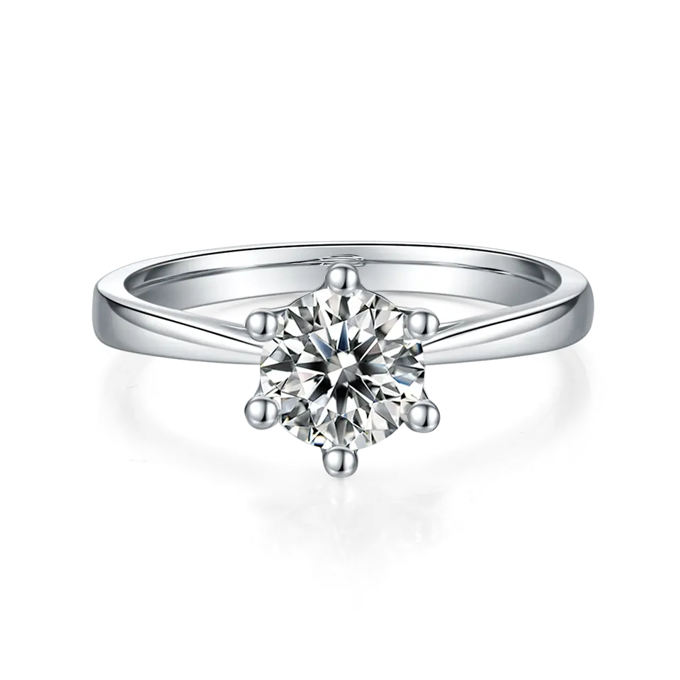 A simple yet elegant sterling silver ring with a brilliant 1.00ct moissanite, highlighted by a unique floral basket six-prong setting.