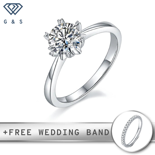 A classic engagement ring featuring a 1.00ct moissanite, held securely by six delicate heart-shaped prongs, set in polished sterling silver.