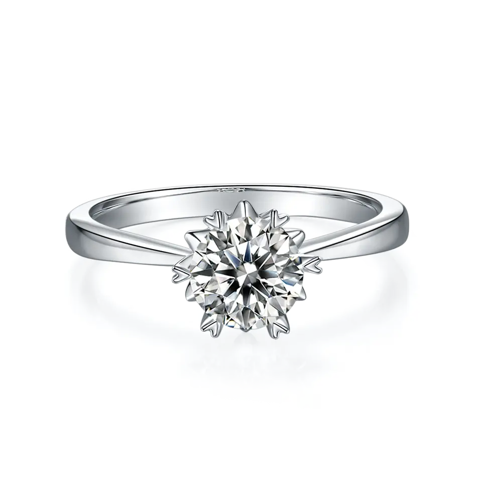 A simple yet romantic sterling silver ring with a brilliant 1.00ct moissanite, highlighted by unique heart-shaped prongs.