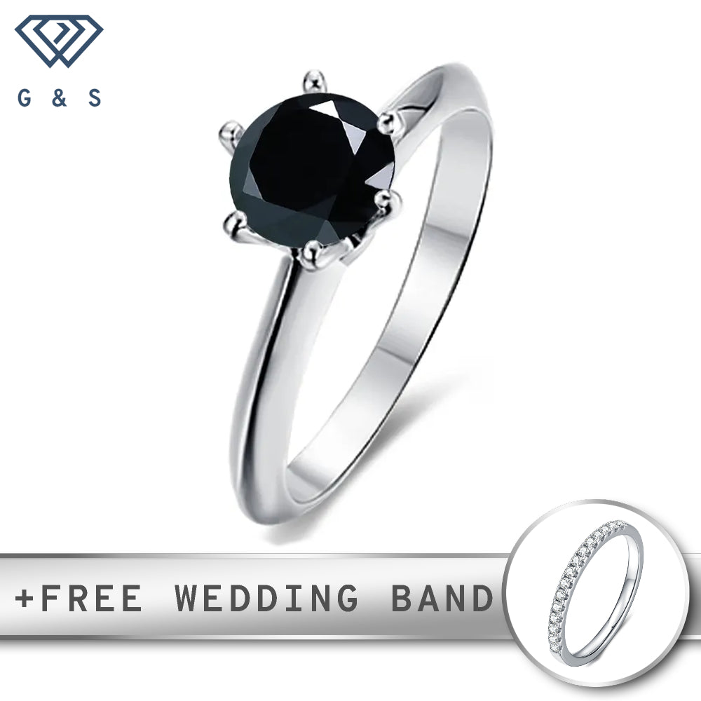 A striking 1.00ct black moissanite is elegantly showcased in a timeless six-prong Tiffany setting, crafted in polished sterling silver.