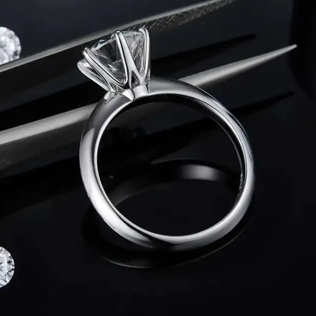 A timeless and elegant engagement ring featuring a brilliant 2.00ct moissanite in a classic 6-prong Tiffany setting.