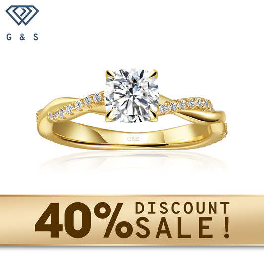A 9ct yellow gold engagement ring with a flowing infinity design and a sparkling cushion cut moissanite.