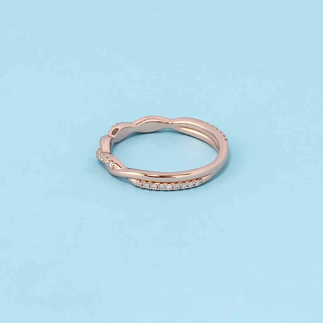 Classic and timeless infinity wedding band set crafted in 9ct rose gold and adorned with moissanites.