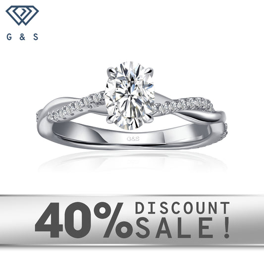 A classic and elegant engagement ring featuring an oval cut moissanite in a timeless infinity setting, crafted in 9ct white gold.