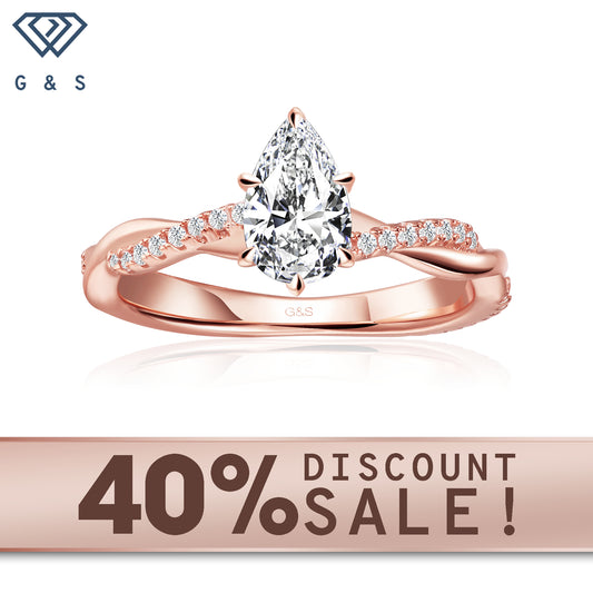 Timeless Infinity pear-shaped moissanite engagement ring in 9ct rose gold.