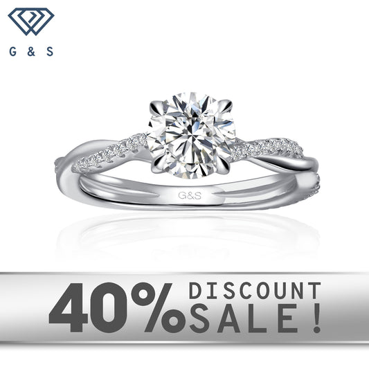 A classic and elegant engagement ring featuring a round brilliant moissanite in a timeless infinity setting, crafted in 9ct white gold.