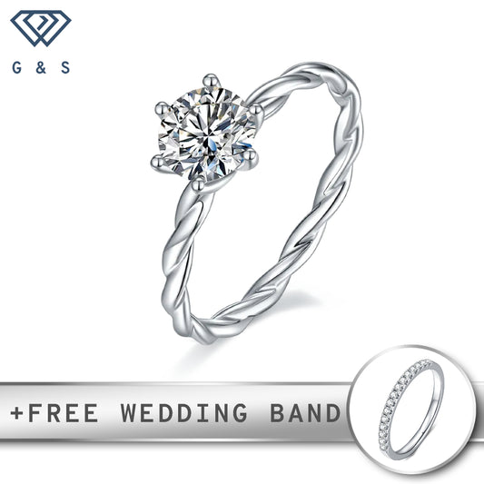 A classic engagement ring featuring a brilliant 1.00ct moissanite set in a sterling silver band with a modern twist shank design.