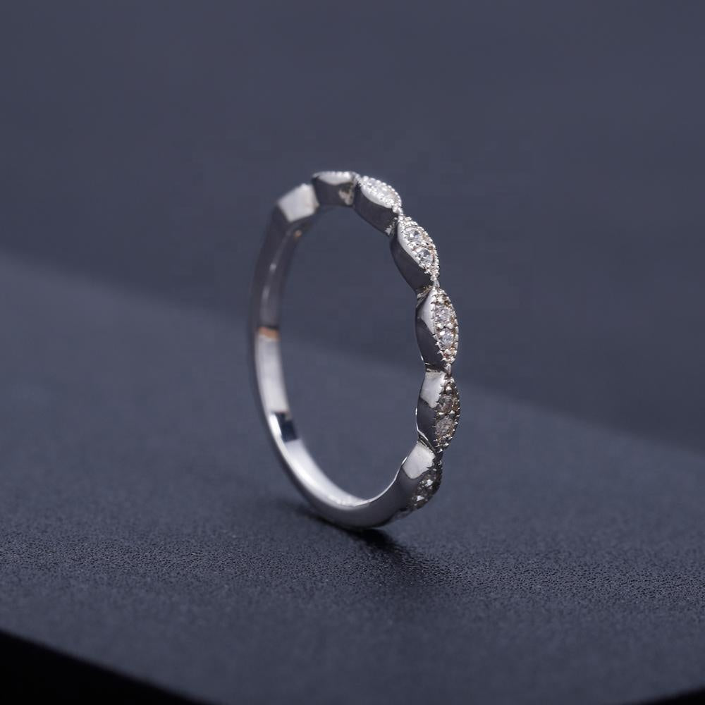 Beautiful and unique wedding rings featuring vintage detailing and brilliant moissanites.