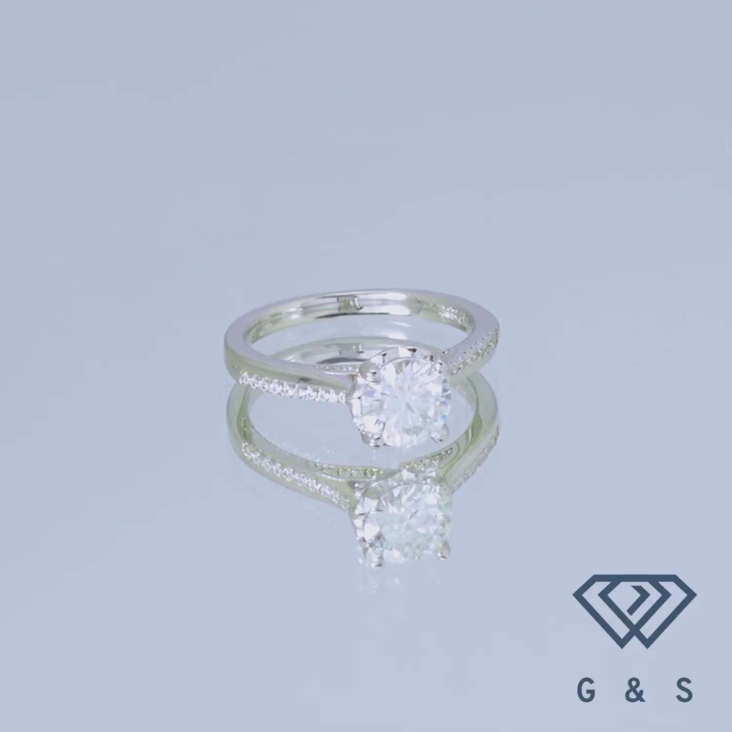 A modern design with a 1.00ct moissanite set in polished sterling silver.