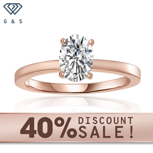 Classic solitaire engagement ring featuring a 1.00ct oval cut moissanite, set in 9ct rose gold with 4 delicate claws.