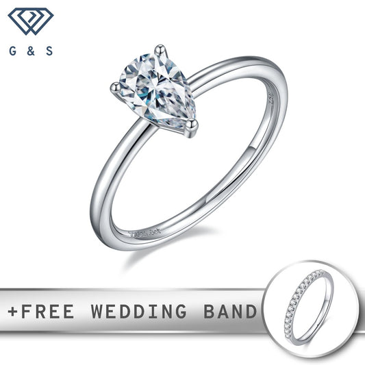 A 1.00ct pear-shaped moissanite sparkles in a simple claw setting on a polished sterling silver band.