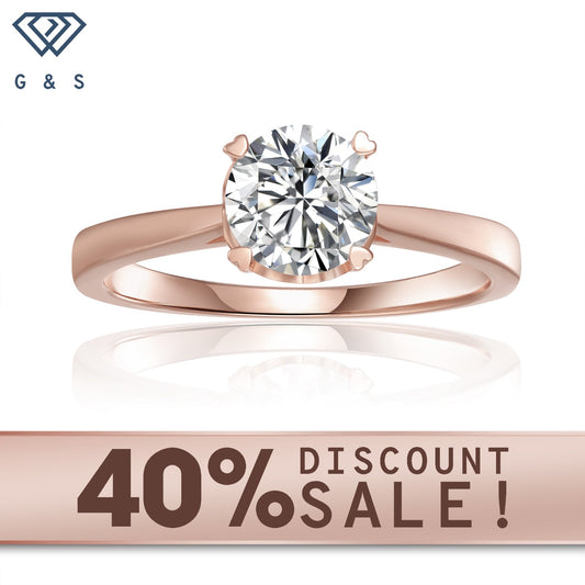 Classic solitaire engagement ring featuring a 1.00ct heart-shaped moissanite, set in 9ct rose gold with 4 delicate claws.