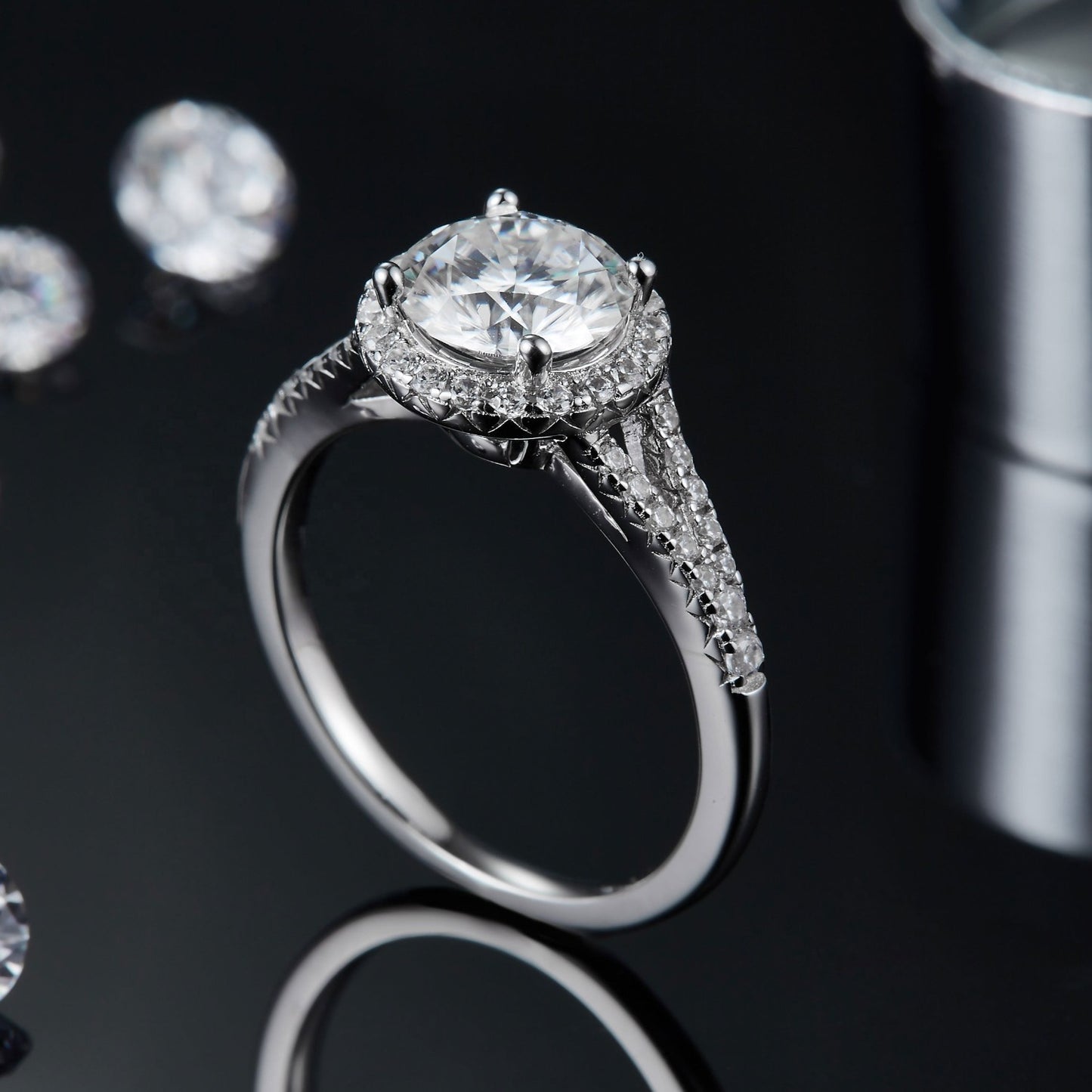 A beautiful engagement ring featuring a 1.50ct moissanite with a refined and delicate halo setting, perfect for a touch of elegance.