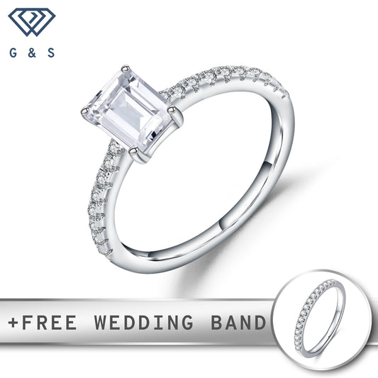 A stunning engagement ring featuring a brilliant 1.00ct emerald cut moissanite set in polished sterling silver.